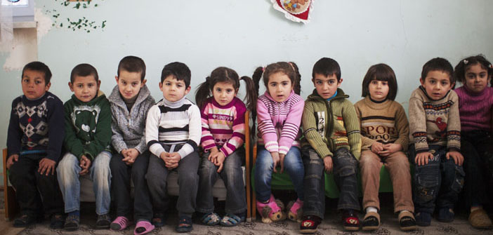 Syrian refugees wait for support