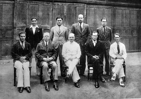 Karageusian Rug Factory managers in China. Schabas seated in the center.