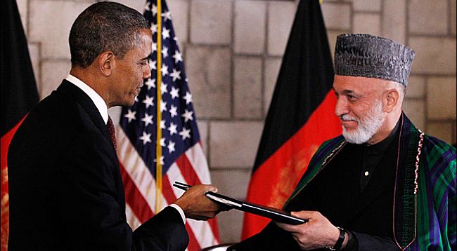 Obama anlaşma imzaladı, Kabil'de bombalar patladı